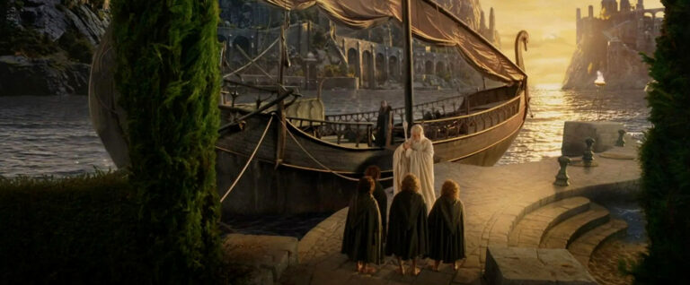 The hobbits and Gandalf at the Gray Havens at the end of the Return of the King.